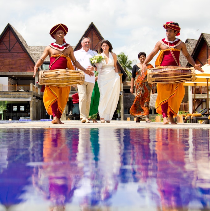 Wedding couple with drammers at Thema Hotels and Resorts