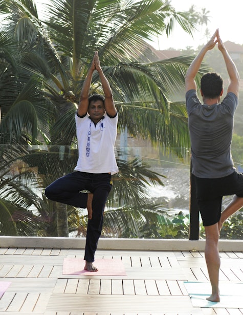 People doing yoga at Thema Hotels and Resorts